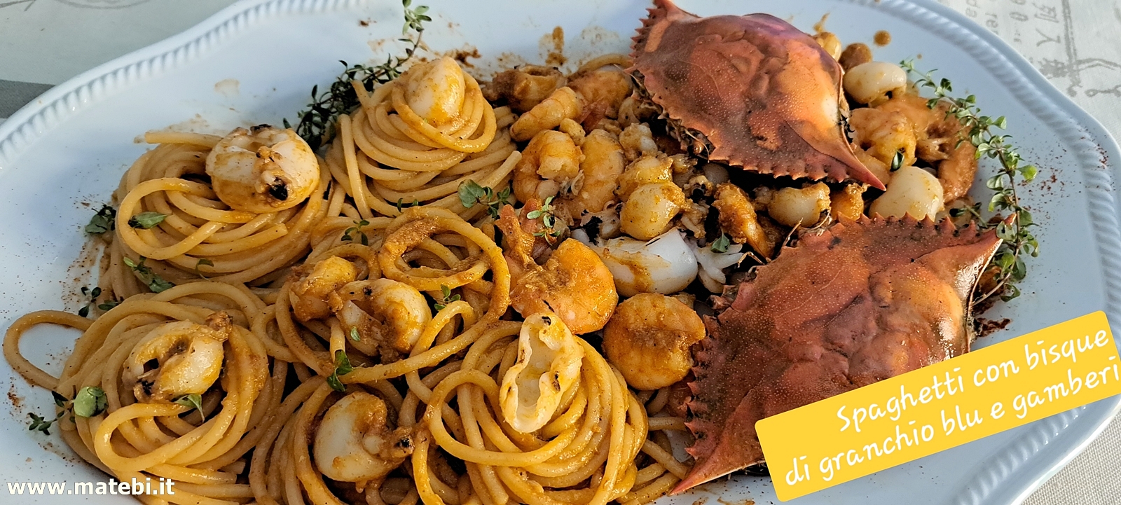 Spaghetti con bisque di granchio blu e gamberi